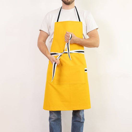 tablier jaune agrumes